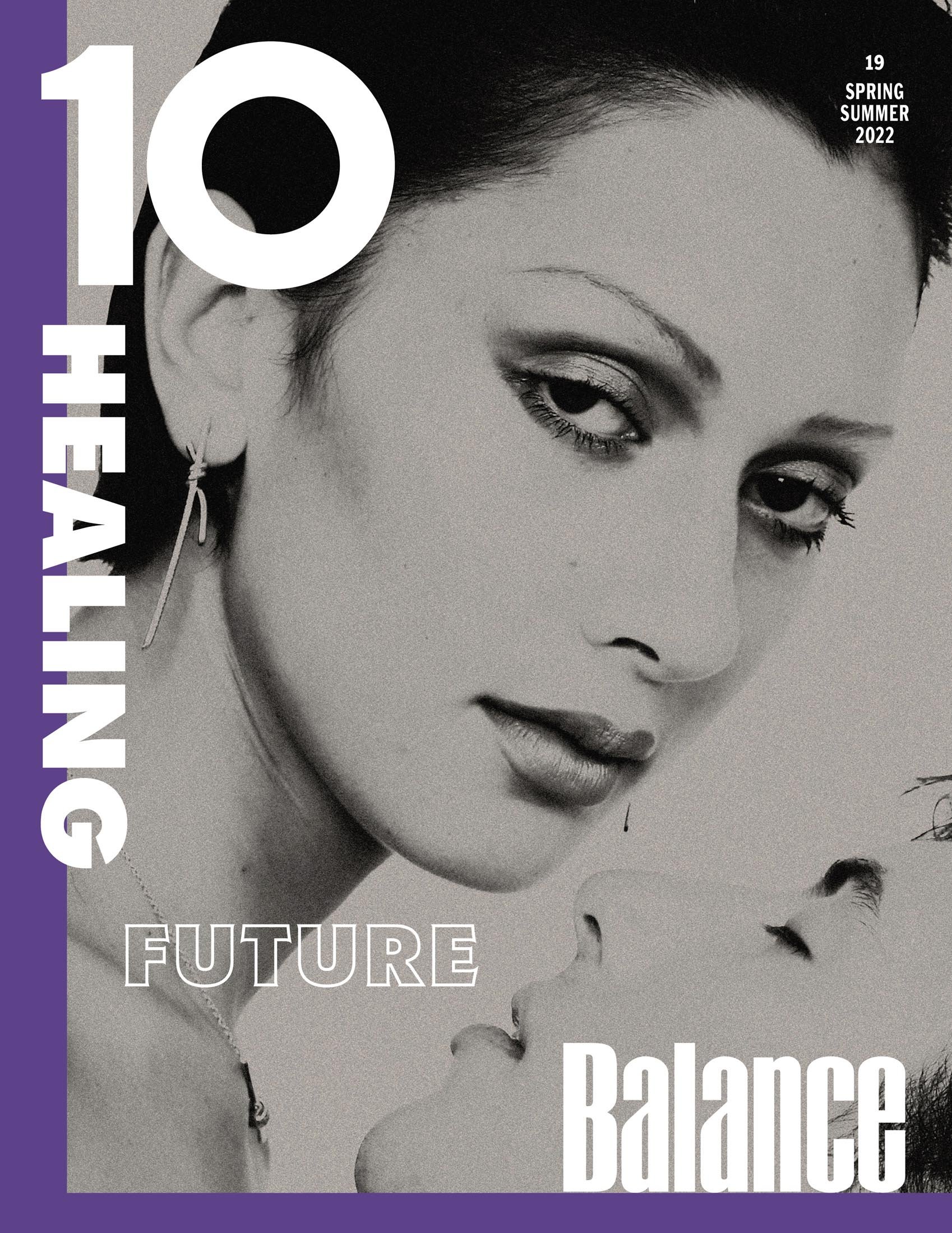 Magazine cover featuring a close-up portrait of two light-skinned women, one looking at the camera, the other with eyes closed.